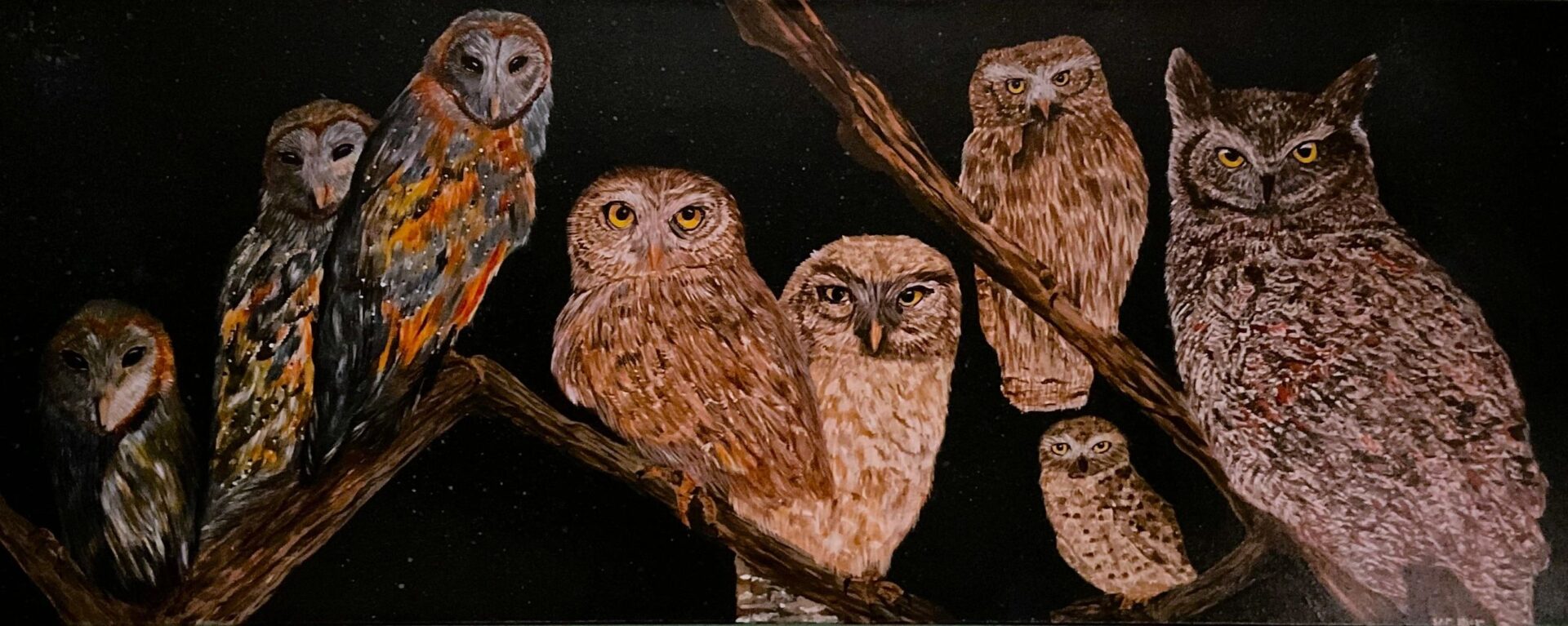 A painting of several owls sitting on branches.